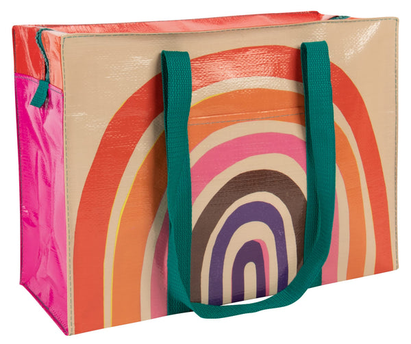 Blue Q Rainbow Shoulder Tote is the carry-everywhere bag featuring a hefty zipper, exterior pocket, wrap-around straps, reinforced floor, 95% recycled material, 11" h x 15" w x 6.25" d